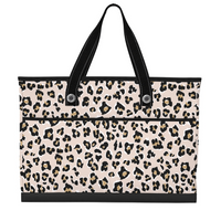 Leopard print tote bag with black handles on a white background