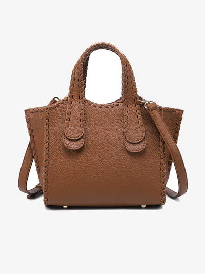 Brown handbag with woven handles on a white background