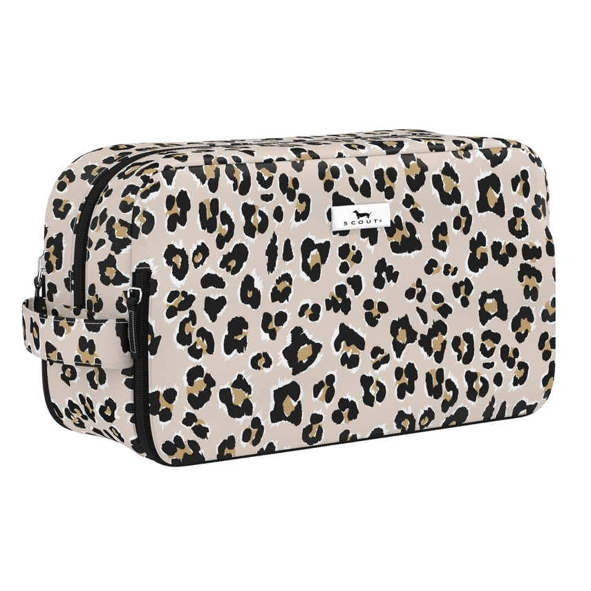 Leopard print toiletry bag with 'SCOUT' logo on a white background