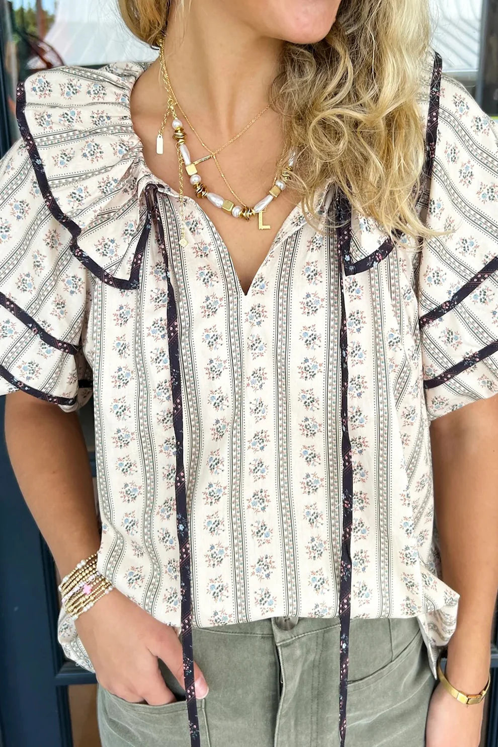 Take A Stroll Ruffled Top by Entro