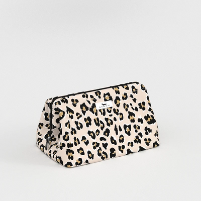 Leopard print cosmetic bag on a light gray background