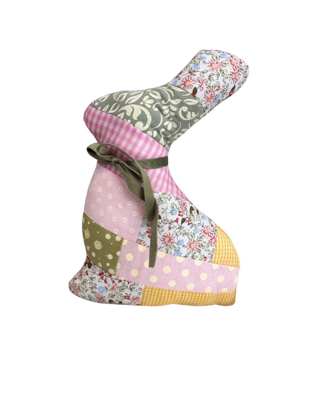 Patchwork-style dog coat with floral and checkered patterns on a white background